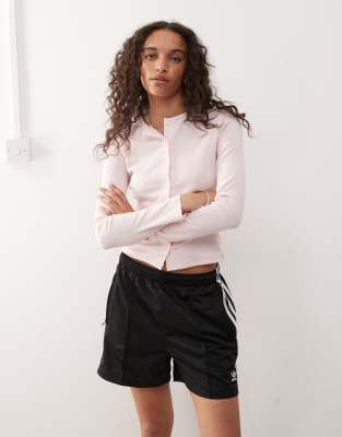 long sleeve pointelle cardigan in soft pink
