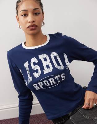 COLLUSION long sleeve ringer baby tee with sporty graphic in navy