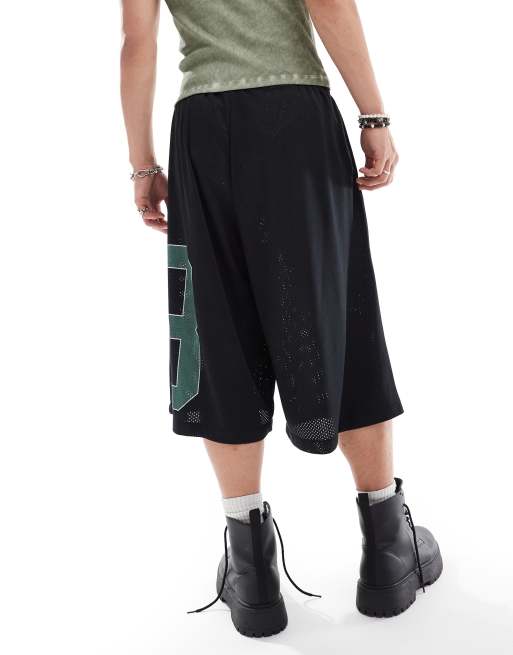COLLUSION Longline basketball shorts in black