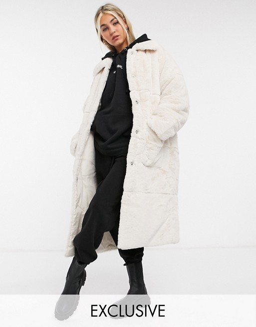 COLLUSION longline faux fur coat in off white