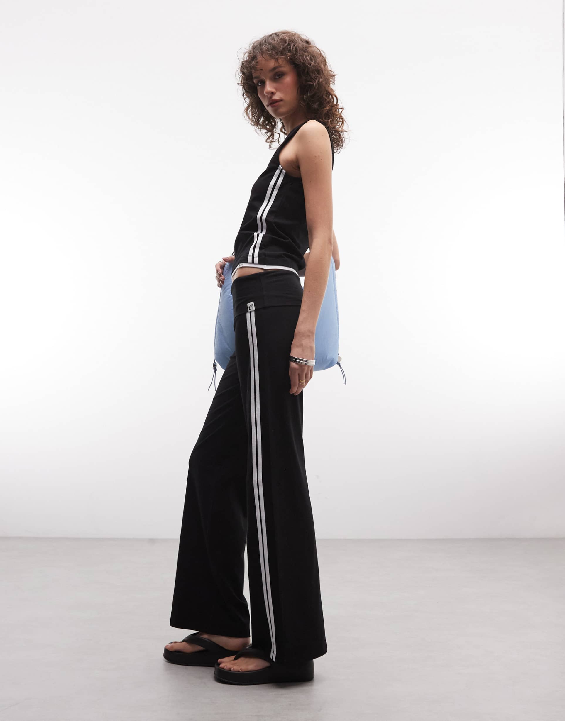 collusion low rise flared track pants in black - part of a set