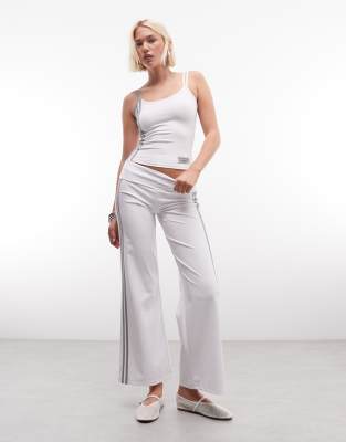 Collusion Low Rise Flared Track Pants In White