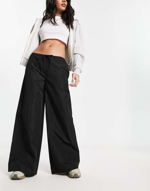 COLLUSION low rise wide leg nylon parachute pant in black | ASOS