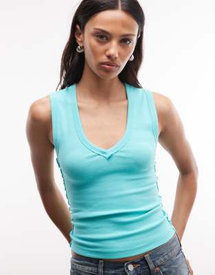 COLLUSION low v neck exposed seam ribbed vest in aqua