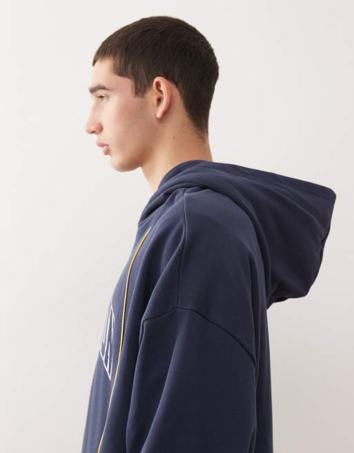 COLLUSION – Marinblå huvtröja med boxig passform, passpoaler och logga, 4 av 5