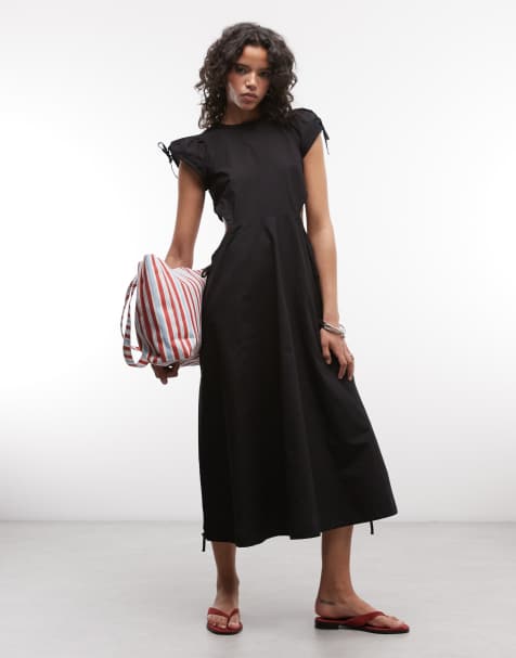 COLLUSION – Maxikleid in Schwarz mit Cut-outs und Röhren-Detail - view 1