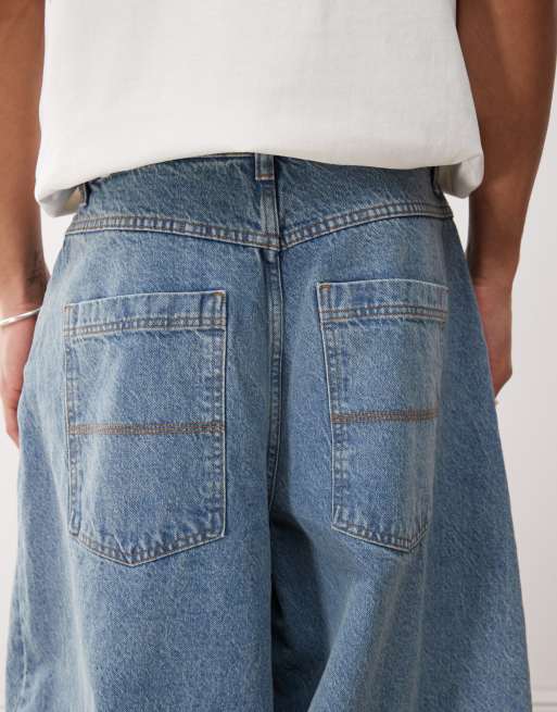 COLLUSION – Ballon-Jeans in mittelblauer Waschung