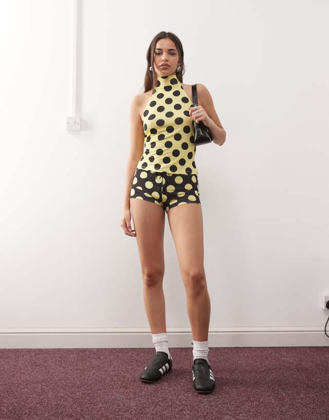 COLLUSION micro mini shorts in yellow giant dot with lace-up