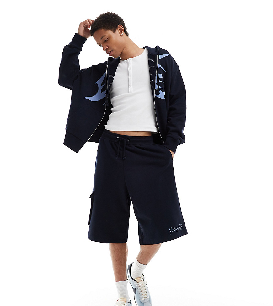 COLLUSION Navy blue skater shorts with emblem long line co-ord