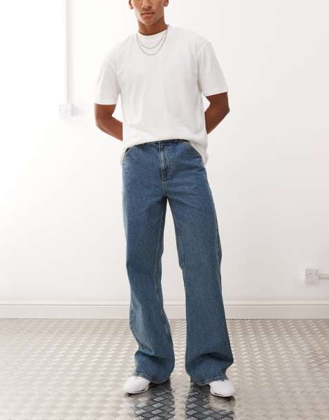 COLLUSION flare jean in mid wash and tobacco stitching