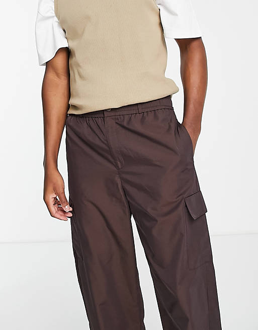 COLLUSION nylon cargo pants with pockets in brown