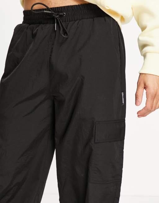 COLLUSION nylon cargo trousers with pockets in black