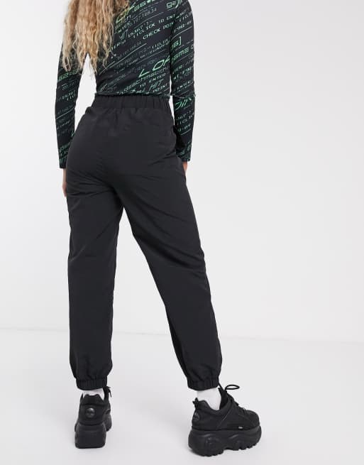 COLLUSION nylon jogger in black