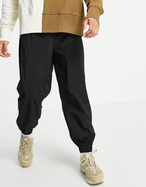 COLLUSION nylon jogger in black