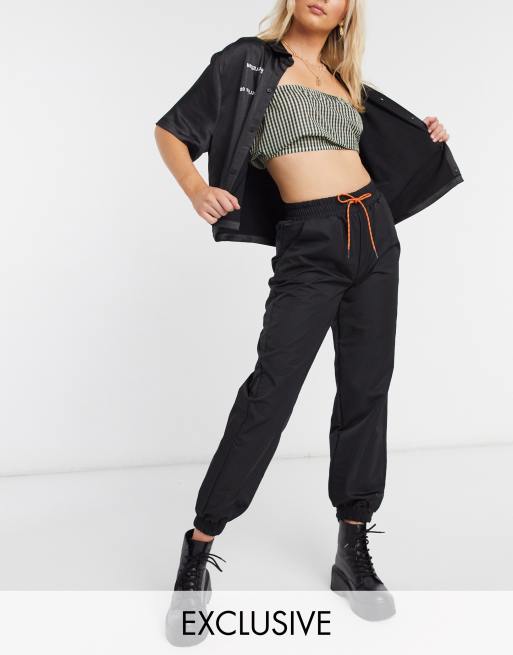 COLLUSION nylon joggers in black ASOS