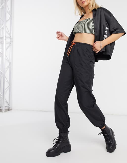 COLLUSION nylon joggers in black ASOS