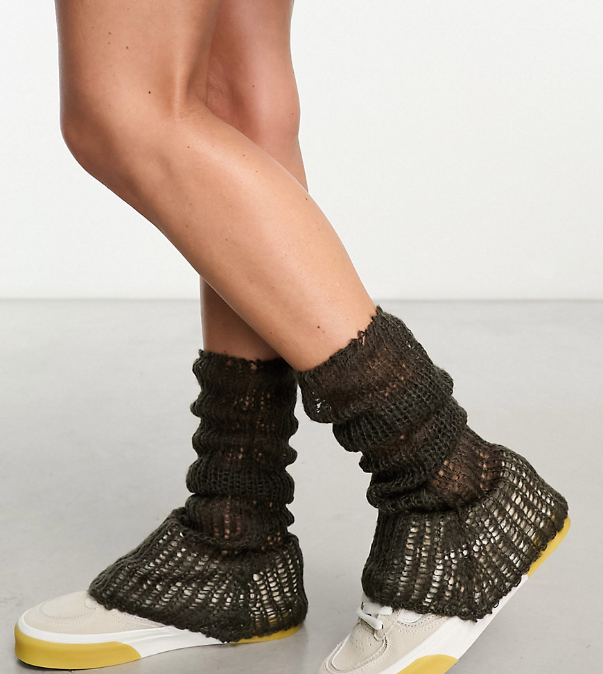 open stitch knitted leg warmers in brown