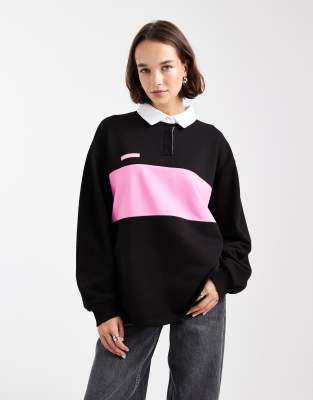 COLLUSION - Oversize-Rugby-Poloshirt in Schwarz mit Colourblock-Design
