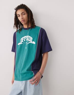 oversized color block with distressed varsity print in blue and green