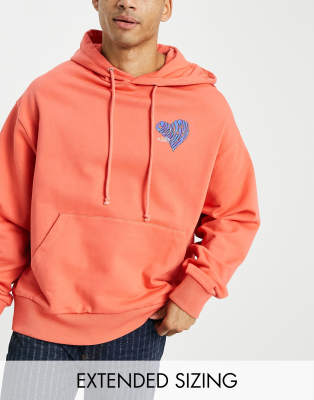 COLLUSION oversized hoodie with logo heart print in orange acid wash