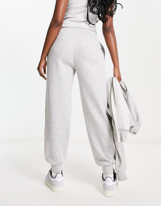COLLUSION Plus oversized sweatpants with branded bum print in