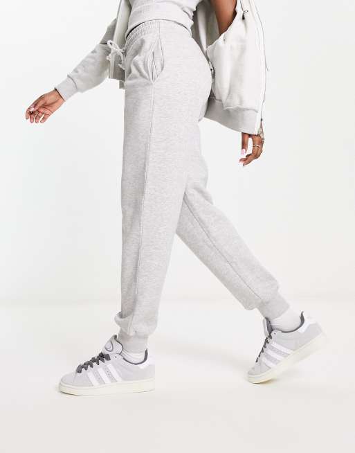 COLLUSION Plus oversized sweatpants with branded bum print in