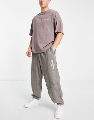 COLLUSION oversized joggers with embroidered logo in tie dye co-ord