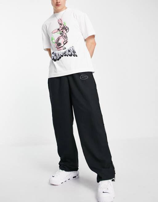 COLLUSION - Oversized joggingbroek met noughties pasvorm en gestrikt detail in zwart