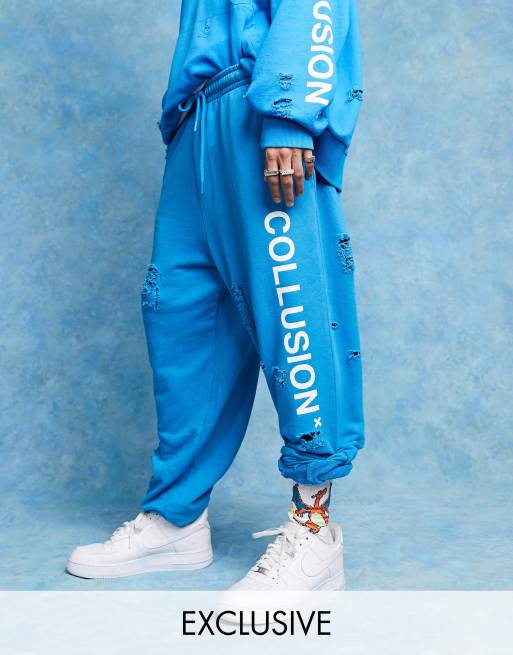 COLLUSION - Oversized joggingbroek met scheuren en logo in blauw, deel van co-ord set
