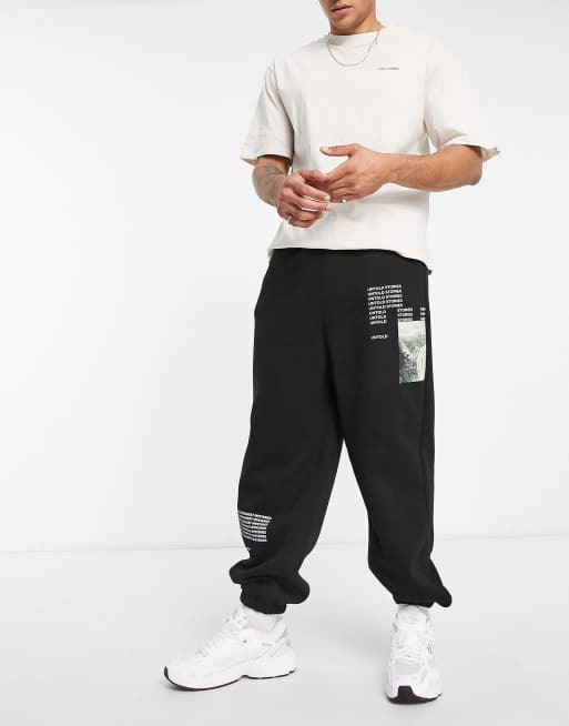 COLLUSION - Oversized joggingbroek met tekstprint in zwart