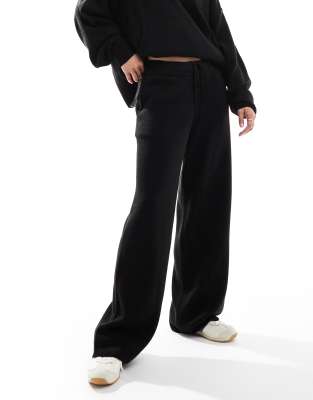COLLUSION oversized knitted trackies in black (part of a set)