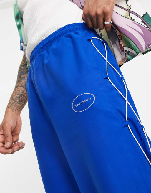 COLLUSION oversized noughties fit joggers with tie detail in blue