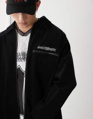 oversized shacket in cord with embroidery detail in black