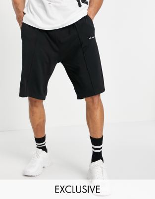 COLLUSION oversized shorts in black polytricot | ASOS