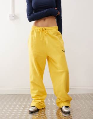 COLLUSION oversized straight leg jogger in yellow with embroidery