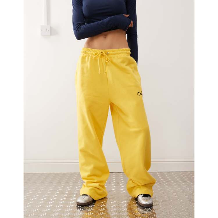 COLLUSION oversized straight leg sweatpants in yellow with embroidery