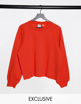 red oversized sweatshirt