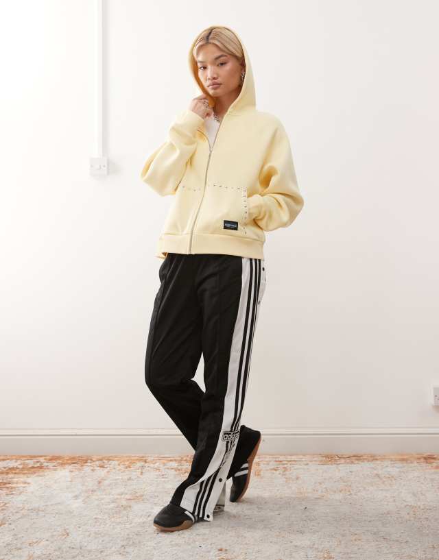 COLLUSION oversized zip up hoodie with stud detail in buttermilk