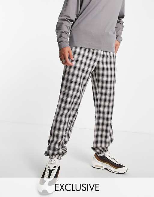 COLLUSION Pantalon de jogging carreaux Noir et blanc