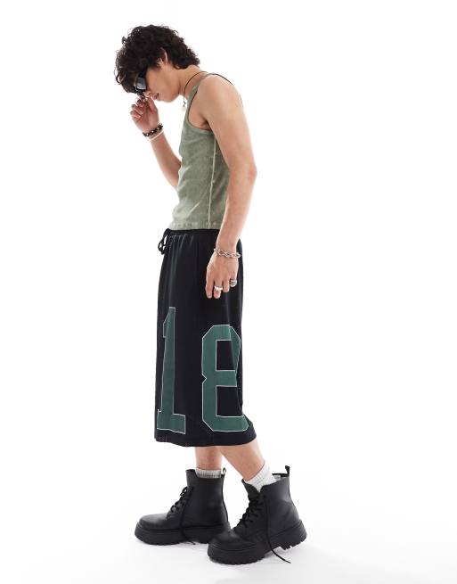 COLLUSION - Pantaloncini neri stile basket taglio lungo