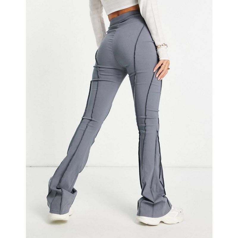 Donna Pantaloni e leggings COLLUSION - Pantaloni a zampa più lunghi sul retro con cuciture ribattute antracite