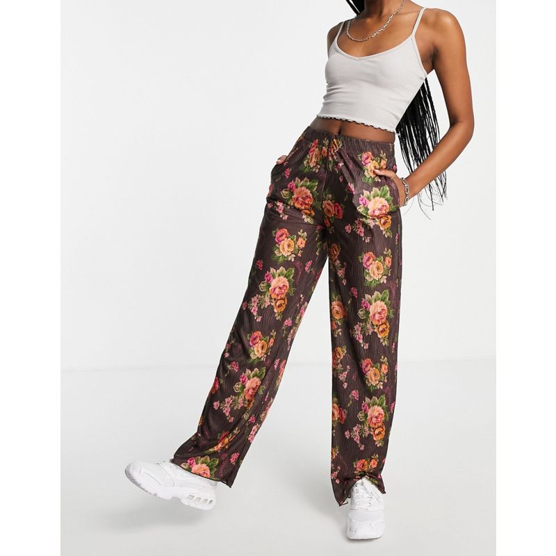 Pantaloni e leggings rfZwR COLLUSION - Pantaloni dritti plissé con stampa a fiori multicolore 