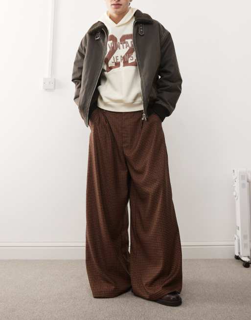 COLLUSION - Pantaloni sartoriali a fondo ampio color ruggine a quadri