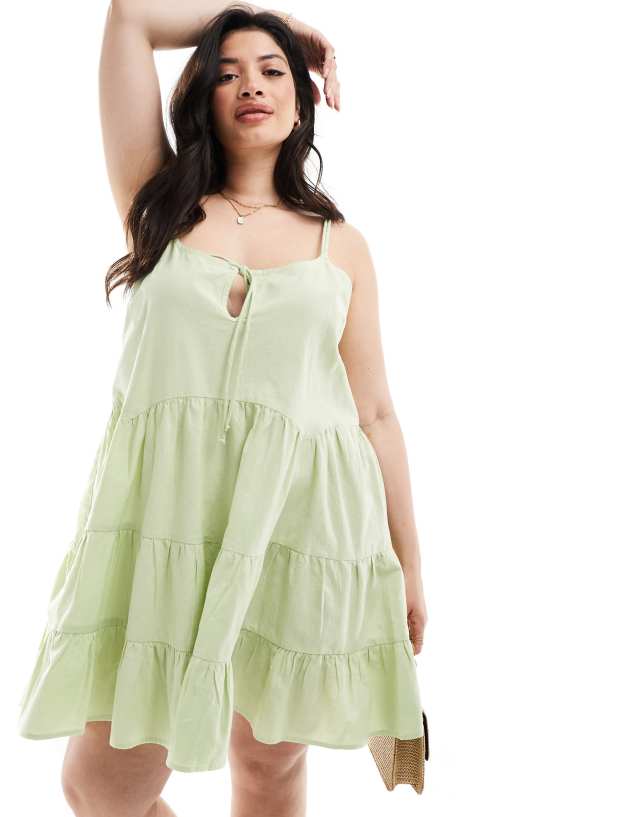 Collusion - plus cotton linen tiered dress with bunny tie and ring detail in sage