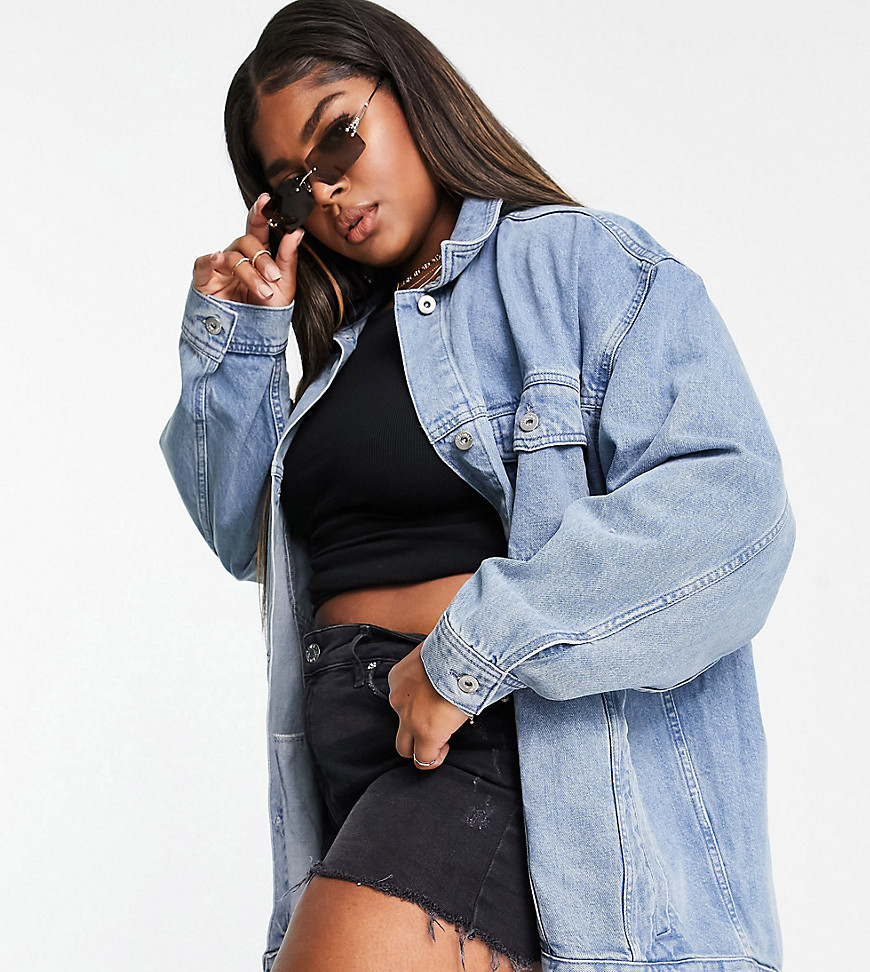 COLLUSION Plus denim jacket with dipped hem in washed blue-Blues