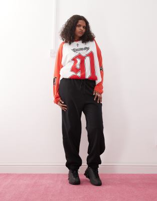 COLLUSION Plus - Pantalon de jogging oversize resserré aux chevilles - Noir