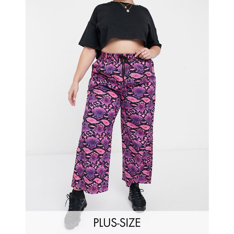 COLLUSION Plus - Pantaloni con fondo ampio rosa pitonato