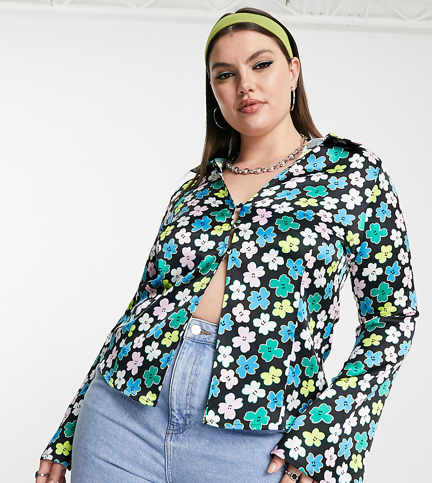 Plus-size shirt by COLLUSION Exclusive to ASOS Spread collar Three-button fastening Fluted sleeves Regular fit