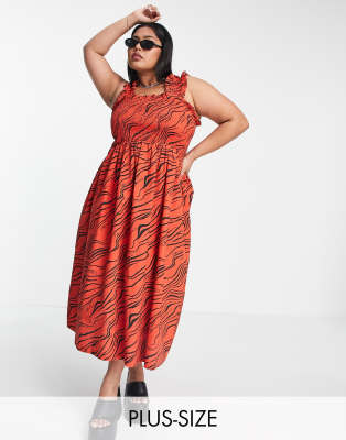 COLLUSION Plus shirred smock maxi dress in red zebra print