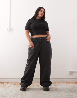 COLLUSION Plus - X001 - Antifit-Jeans in verwaschenem Schwarz mit mittelhohem Bund